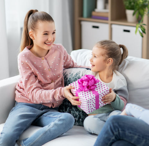 Girls giving gifts